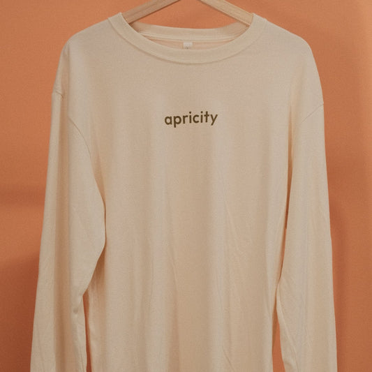 Beige long-sleeve shirt with 'apricity' branding